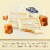 Ghirardelli® White Chocolate Squares with Caramel Filling Holiday Candy Bag Perspective: left