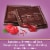 Ghirardelli® Raspberry Filled Dark Chocolate Squares Perspective: left