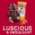 Ghiradelli® Milk Chocolate Caramel Snowmen Holiday Candy Perspective: left