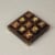 Skull and Crossbones 5 inch Square Wooden Mini Tic Tac Toe Game Board Perspective: left
