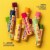 Burt's Bees Moisturizing Wild Cherry Lip Balm Perspective: left
