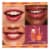 NYX Professional Makeup Duck Plump Lip Gloss 09 Strike A Rose Perspective: left