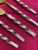 Vibhsa Designer Gold Flatware 5 Piece Place Setting Twisted Perspective: left