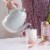 Pinky Up Noelle Ceramic Electric Tea Kettle Perspective: left