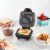 Dash® Pocket Sandwich Maker in Red Perspective: left