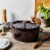 Staub Cast Iron Oval Cocotte, Dutch Oven, 5.75-quart, serves 5-6, Made in France, Grenadine Perspective: left
