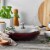 Staub Cast Iron 2.9-qt Daily Pan with Glass Lid - Grenadine Perspective: left