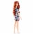 Barbie Doll Red Hair Wearing Yellow and Purple Heart-Print Dress and Platform Sneakers Perspective: left
