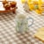 Sewing Down South Ceramic Mug - Hydrangea Perspective: left