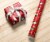 Holiday Home® 40 Inch Playful Penguins Gift Wrap Roll Perspective: left