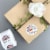 Wrapables 1.5 Inch Rainbow Thank You Stickers Roll for Boxes & Bags (500pcs) Perspective: left