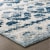 Abstract Diamond Moroccan Trellis 5x8 Indoor and Outdoor Area Rug - Ivory and Blue Perspective: left
