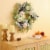 Glitzhome 22-Inch Fall Pumpkin Wreath with Leaves and Berries for Front Door Perspective: left