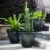 Glitzhome Oversized Faux Ceramic Round Plastic Pot Planter - Black Perspective: left