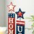 Glitzhome Set of 2 Wooden Patriotic/Americana Firecracker Table Sign Perspective: left