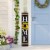 Glitzhome 8 Inch x 42 Inch Tall Wooden Home Porch Sign with 3 Changeable Wreaths - Black Perspective: left