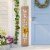 Glitzhome 60 Inch Wooden Welcome Porch Sign with 4 Changeable Wreaths - Natural Wood Perspective: left