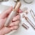 Finishing Touch® Flawless™ Coral Rose Gold Ladies Hair Remover Perspective: right