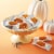 REESE'S Snack Size Orange-Colored Peanut Butter Pumpkins Halloween Candy Perspective: right