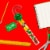 M&M'S Holiday Peanut Milk Chocolate Christmas Candy Cane Tube Perspective: right
