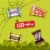 Snickers Twix Milky Way & 3 Musketeers Minis Halloween Candy Variety Pack Bulk Bag Perspective: right