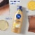 NIVEA Q10 Skin Firming Melanin Beauty & Hydration Body Lotion Perspective: right