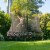 Springfree Trampoline Kids Outdoor Medium Oval 8 x 11' Trampoline with Enclosure Perspective: right