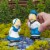 Gardens Alive! Minature Kissing Dutch Couple Garden Statues Perspective: right
