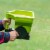 Gardens Alive! Handheld Broadcast Seed and Fertilizer Spreader Perspective: right