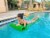 Vos 72 Soft Wavy Foam UV Chlorine Resistant Water Pool Float, Coral (2 Pack) Perspective: right
