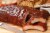 Curly's Hickory Smoked & Seasoned Baby Back Pork Ribs with Barbecue Sauce Perspective: right