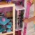 KidKraft Uptown Wooden Dollhouse Mansion with Modern Furniture Set, Pink Perspective: right