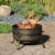 Sunnydaze 24 in Cauldron Steel Fire Pit with Spark Screen, Poker, and Grate Perspective: right