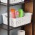 Sterilite Large Ultra Plastic Storage Bin Baskets with Handles, White, 12 Pack Perspective: right