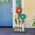 Glitzhome Wooden Trio Flowers and Fence Welcome Porch Décor Perspective: right