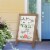 Glitzhome "Welcome to the Porch" Wood Framed Easel Porch Sign with Flowers Perspective: right