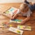 Melissa & Doug Colorful Wooden Letters See and Spell Perspective: top