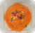 Whipped Satin Yellow Cupcake With Icing Perspective: top