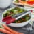 KitchenAid® Gourmet Stainless Steel Red Utility Tongs Perspective: top