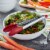 KitchenAid® Gourmet Stainless Steel Red Utility Tongs Perspective: top