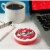 ICE BREAKERS Cinnamon Flavored Sugar Free Mints Puck Perspective: top