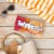 TWIZZLERS Filled Twists Orange Cream Pop Flavored Licorice Style Chewy Candy Bag Perspective: top