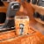 ICE BREAKERS Ice Cubes Orange Cream Pop Flavored Sugar Free Chewing Gum Bottle Perspective: top