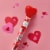 HERSHEY'S KISSES Milk Chocolate Valentine Candy Plastic Cane Perspective: top