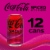 Coca-Cola® Zero Sugar Spiced Raspberry Soda Cans Perspective: top