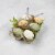Northlight Pack of 6 Assorted Easter Eggs with Carton and Grass Decoration Perspective: top