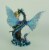 Mermaid Sitting with Blue Sea Dragon Statue Perspective: top