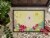 Carolines Treasures BB6030MAT Easter Eggs Samoyed Doormat 18x27 Perspective: top