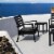 Siesta ISP004-BLA-CCH Artemis XL Outdoor Club Chair with Sunbrella Charcoal Cushion - Black - Perspective: top
