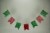 Red and Green Enamel Metal Believe Banner Christmas Rope Garland Holiday Decor Perspective: top